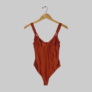 Out From Under Rust Bodysuit
